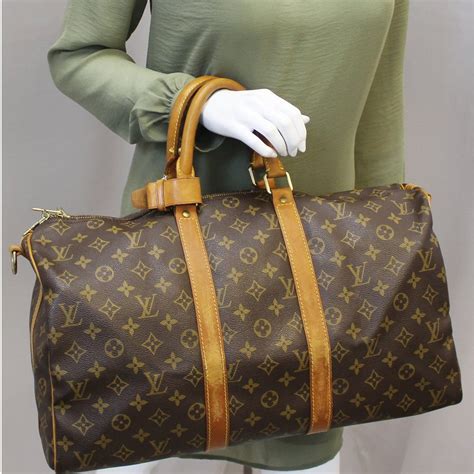 cheap louis vuitton duffle bag mens|louis vuitton travel bag men.